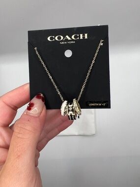 242. COACH Gold-Tone Pendant Necklace in Gold 16” - 18”